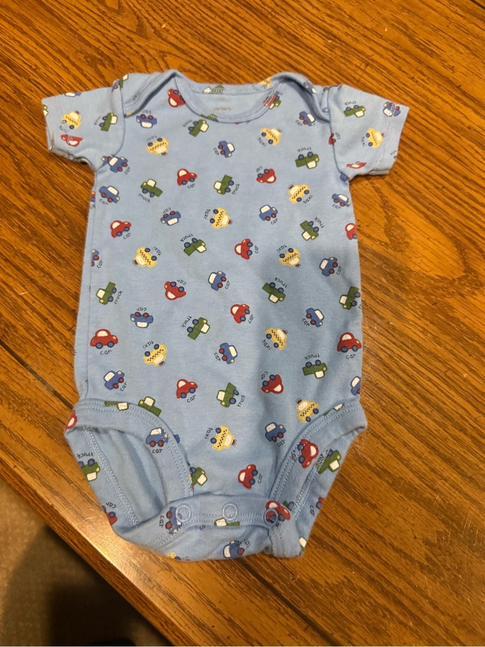 6 for $10 Blue Baby Onesie with Colorful Car Print